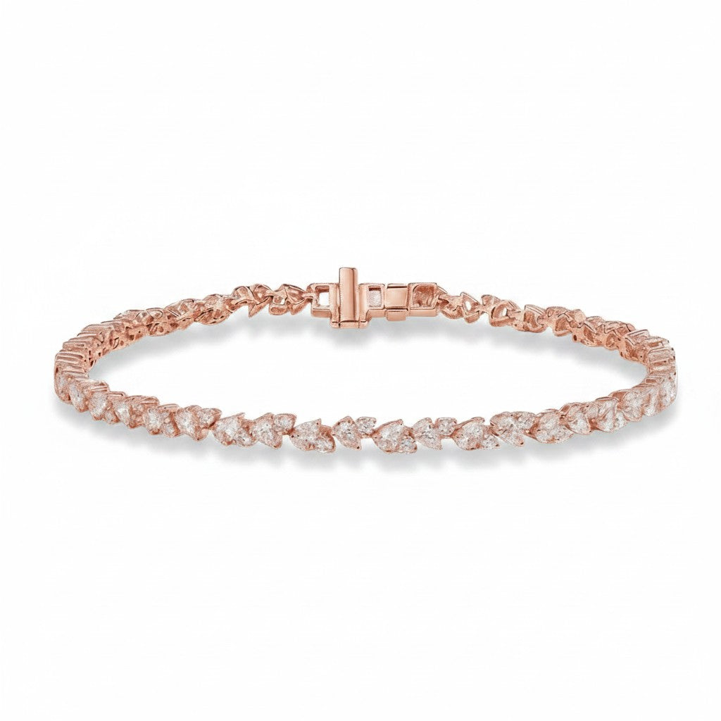 My Store 4 rose gold tennis bracelet featuring an alternating pattern of pear-cut and round-cut diamonds.