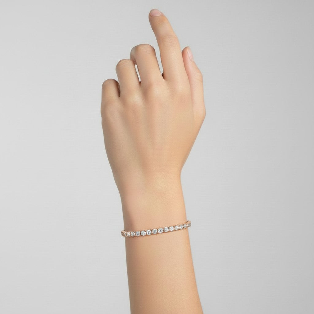 My Store 4 custom 4-prong diamond tennis bracelet in rose gold worn on a wrist, featuring brilliant round-cut diamonds.