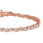 My Store 4 rose gold tennis bracelet featuring an alternating pattern of pear-cut and round-cut diamonds.