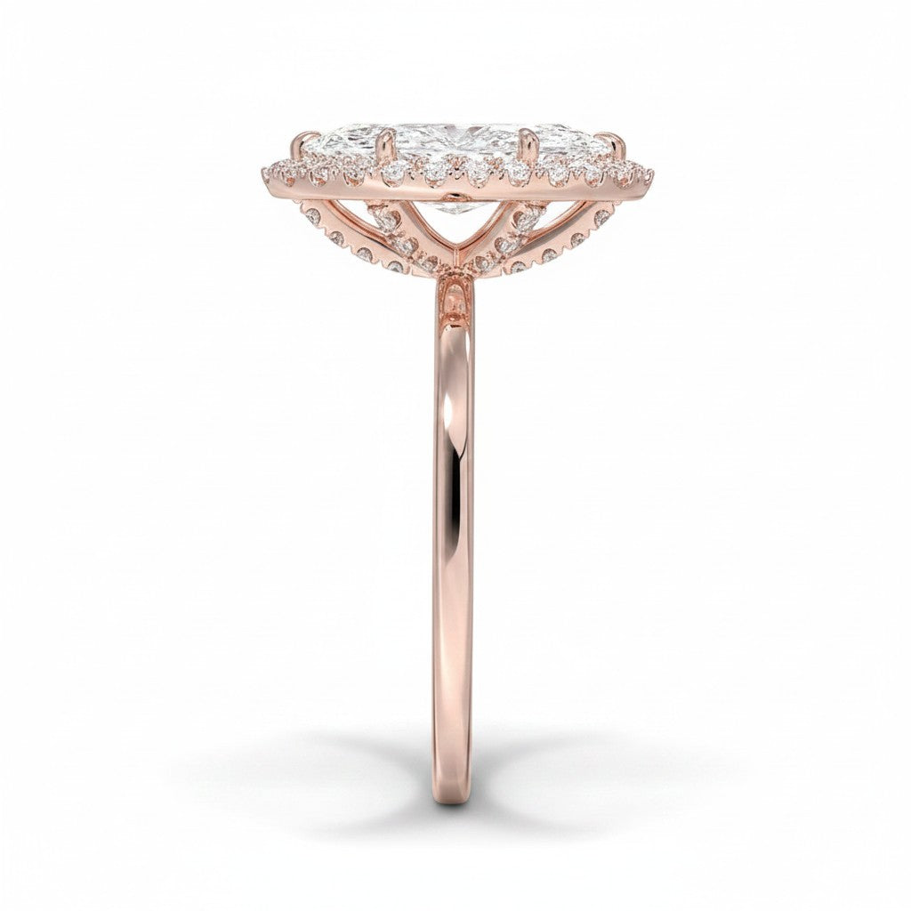 My Store 4 18K rose gold heritage halo engagement ring with a central lab-grown diamond, side profile view.
