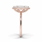 My Store 4 18K rose gold heritage halo engagement ring with a central lab-grown diamond, side profile view.