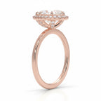 My Store 4 18K rose gold halo engagement ring with a lab-grown diamond, side view showing intricate setting details.