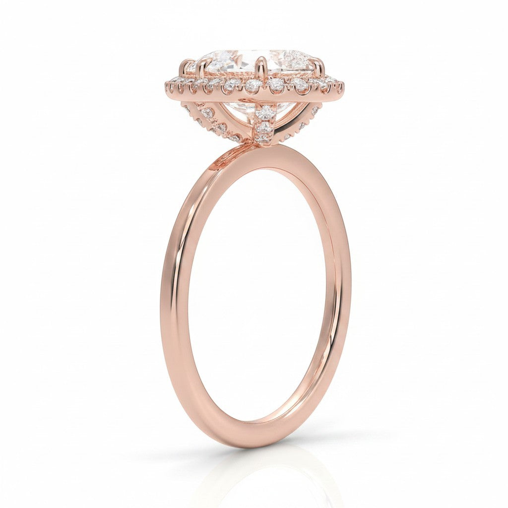 My Store 4 18K rose gold halo engagement ring with a lab-grown diamond, side view showing intricate setting details.