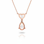 My Store 4 rose gold necklace featuring a heart-cut diamond above a suspended pear-cut diamond drop pendant.