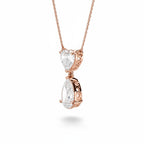 My Store 4 rose gold pendant necklace featuring a heart-cut diamond above a suspended pear-cut diamond drop.