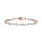 My Store 4 rose gold tennis bracelet featuring alternating marquise and round cut diamonds in a prong setting.