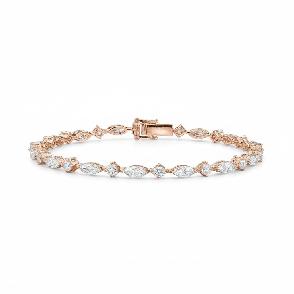 My Store 4 rose gold tennis bracelet featuring alternating marquise and round cut diamonds in a prong setting.