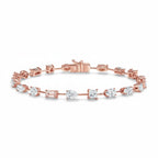 My Store 4 rose gold tennis bracelet featuring a mix of pear, emerald, princess, oval, and round cut diamonds.