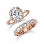 My Store 4 rose gold bridal set with an oval diamond halo engagement ring and a matching oval eternity wedding band.
