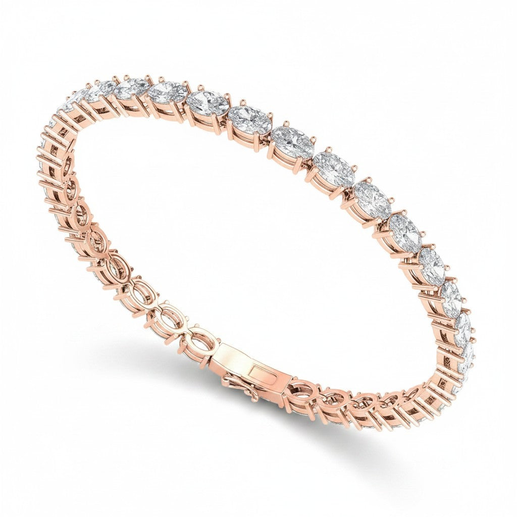 My Store 4 rose gold tennis bracelet featuring horizontally set oval cut diamonds in a secure basket setting.