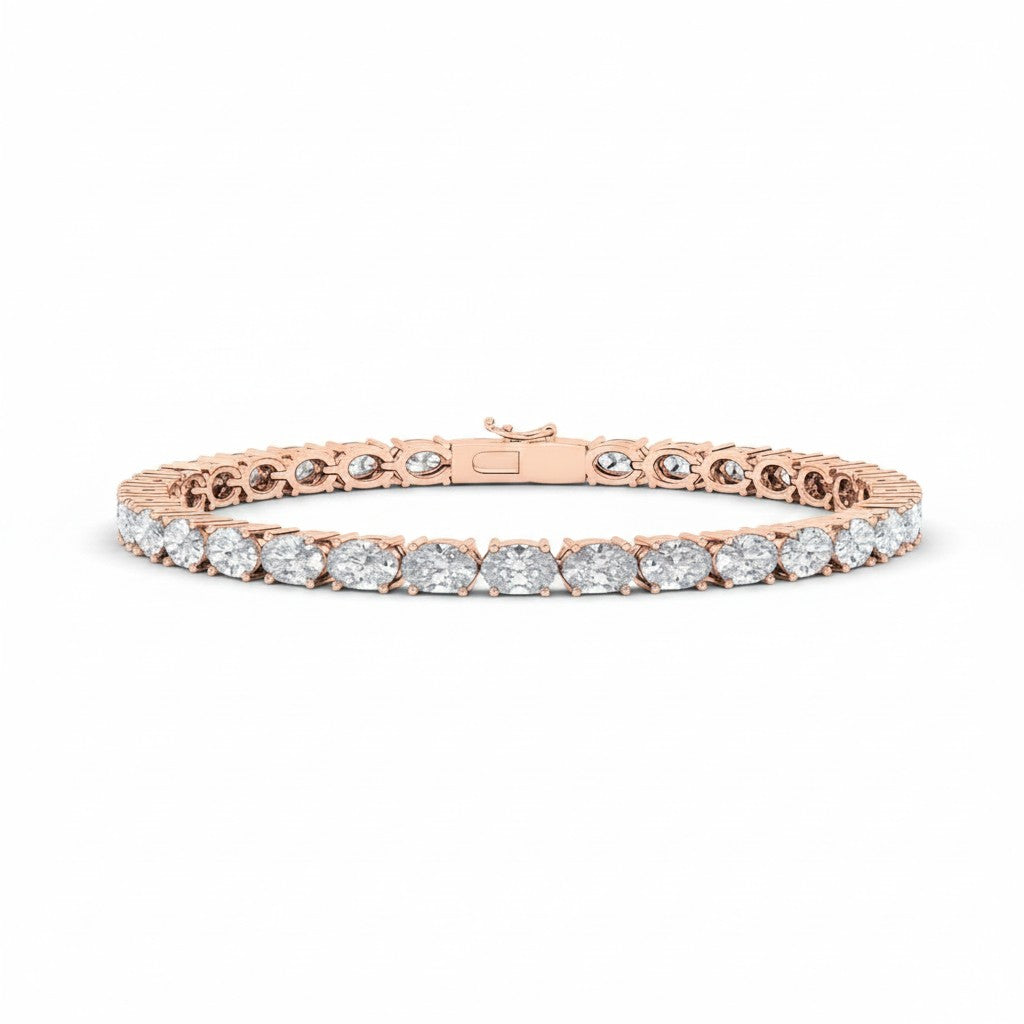 My Store 4 rose gold tennis bracelet featuring horizontally set oval cut diamonds in a secure basket setting.