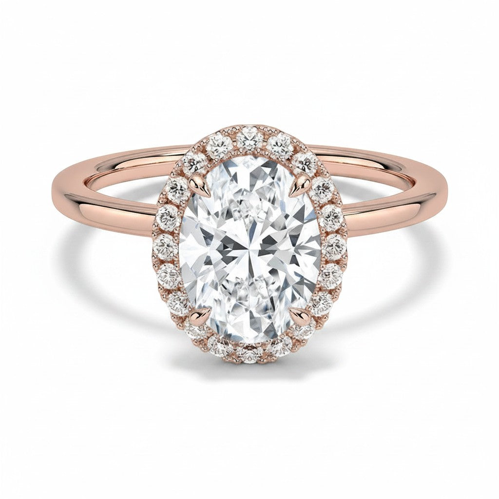 My Store 4 18K rose gold oval halo engagement ring featuring a sparkling lab-grown diamond center stone.