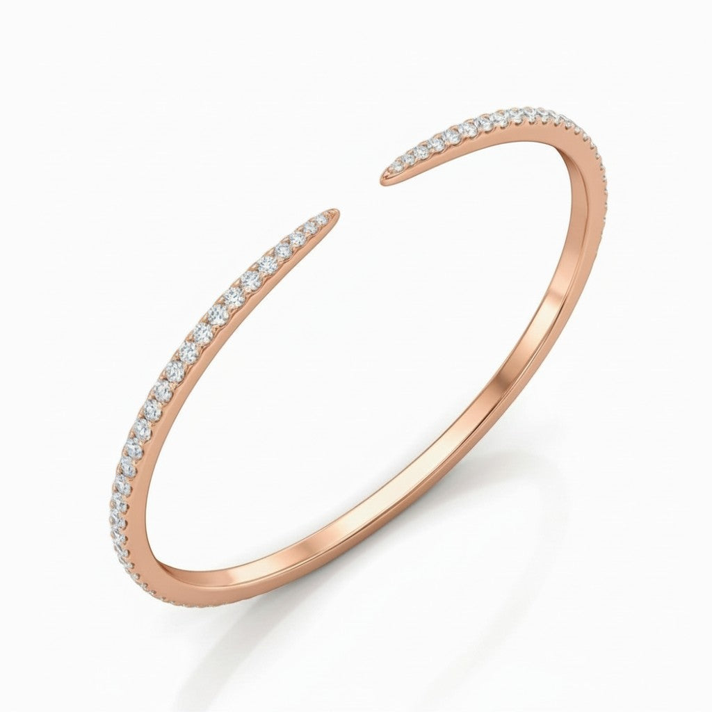 My Store 4 open cuff bangle in rose gold with a delicate micro-pavé diamond setting on a white background.