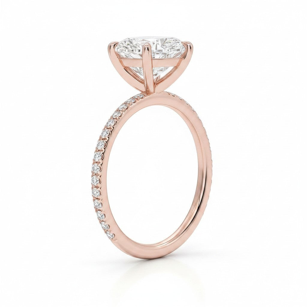 My Store 4 18K rose gold solitaire engagement ring with a central lab-grown diamond and pavé-set band side view