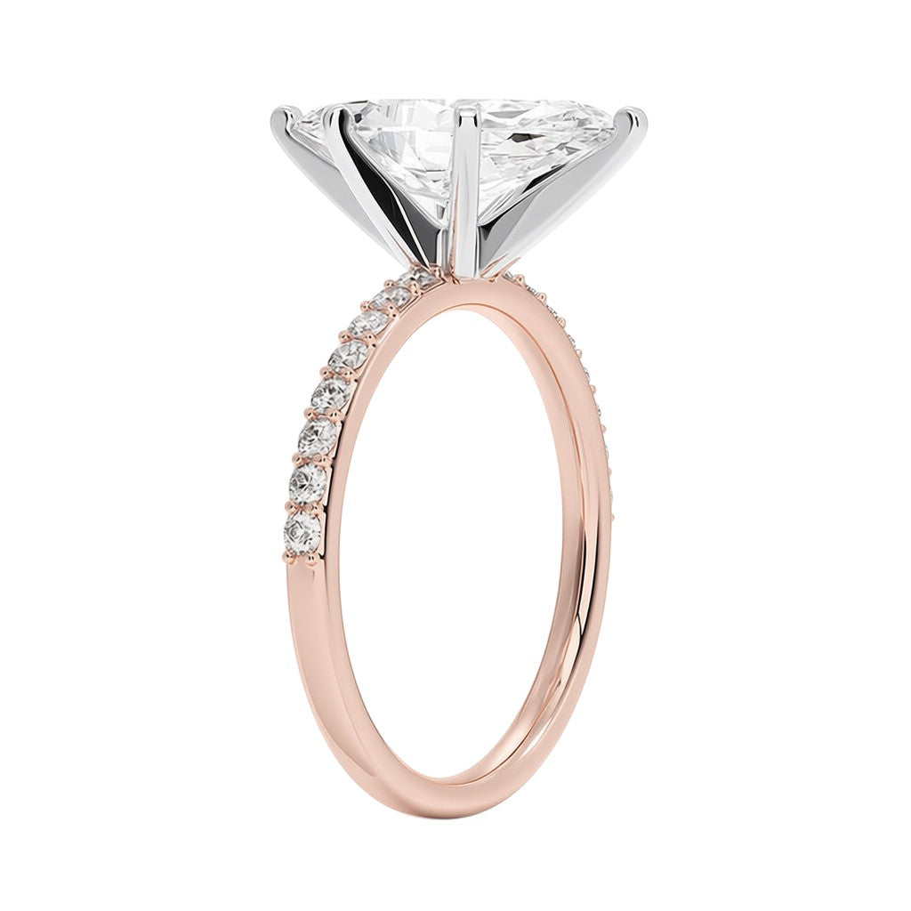My Store 4 18K rose gold solitaire ring with a central lab-grown diamond and pavé-set diamond band, side view.