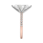 My Store 4 18K gold solitaire ring featuring a central diamond and pavé-set diamonds on a rose gold band, side view.