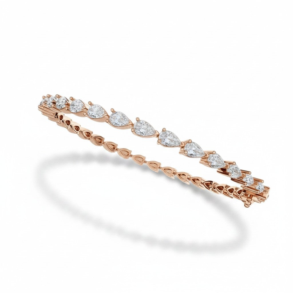My Store 4 rose gold tennis bracelet featuring a continuous line of pear-cut diamonds in a secure prong setting.