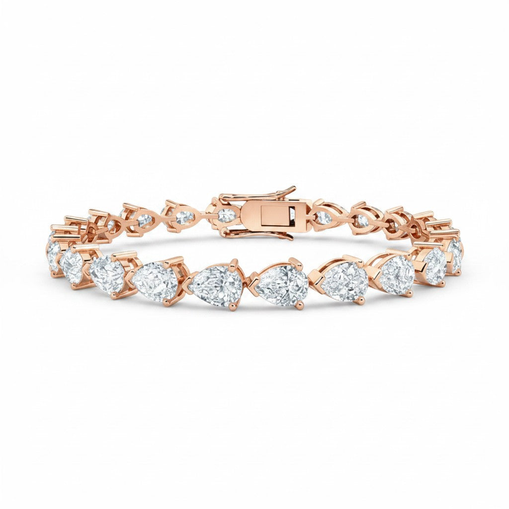 My Store 4 rose gold tennis bracelet featuring a continuous line of brilliant pear-cut diamonds in a secure prong setting.