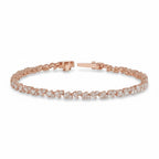 My Store 4 rose gold tennis bracelet featuring an alternating pattern of pear-cut and round-cut diamonds.