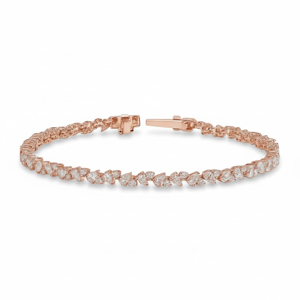 My Store 4 rose gold tennis bracelet featuring an alternating pattern of pear-cut and round-cut diamonds.