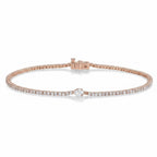 My Store 4 rose gold tennis bracelet featuring a central pear-cut diamond surrounded by a line of round brilliant diamonds.