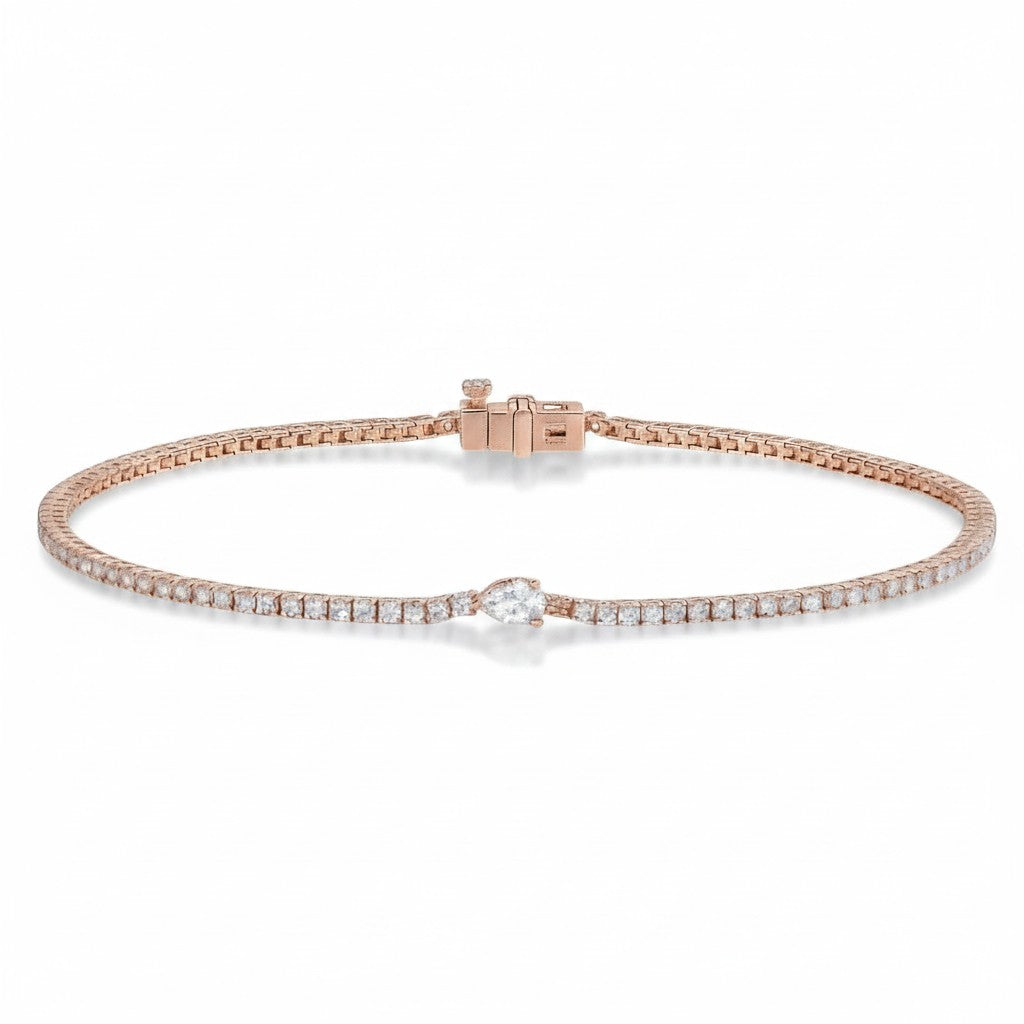 My Store 4 rose gold tennis bracelet featuring a central pear-cut diamond surrounded by a line of round brilliant diamonds.