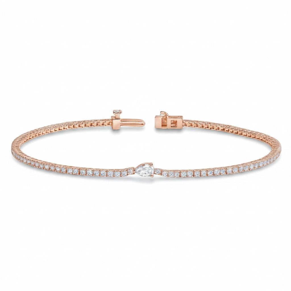 My Store 4 rose gold tennis bracelet featuring a continuous line of round diamonds and a central pear-cut diamond.
