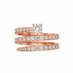 My Store 4 rose gold spiral coil engagement ring with a round solitaire diamond and pavé-set diamond multi-row band.