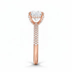 My Store 4 rose gold engagement ring with a round solitaire diamond and a triple-row micro-pavé band, side view.