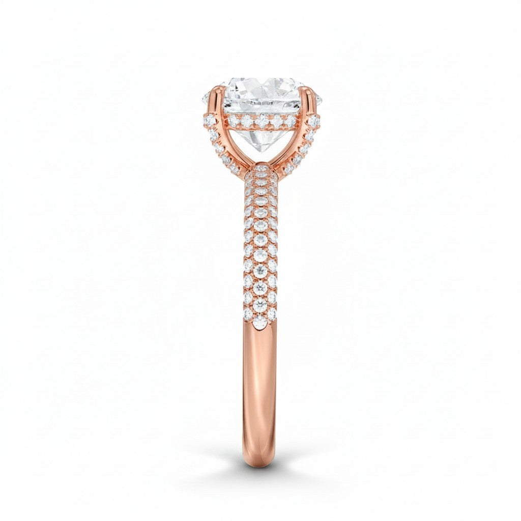 My Store 4 rose gold engagement ring with a round solitaire diamond and a triple-row micro-pavé band, side view.