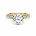 My Store 4 round cut engagement ring in 18K yellow gold with a six-prong setting and pavé diamond band