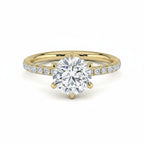 My Store 4 round cut engagement ring in 18K yellow gold with a six-prong setting and pavé diamond band