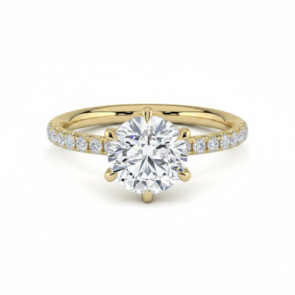 My Store 4 round cut engagement ring in 18K yellow gold with a six-prong setting and pavé diamond band