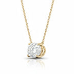 My Store 4 solitaire pendant necklace featuring a brilliant round diamond in a yellow gold four-prong setting.
