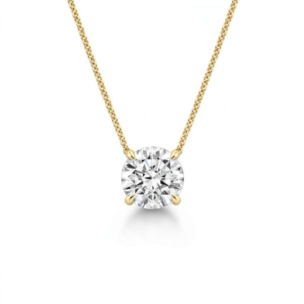My Store 4 round brilliant-cut diamond solitaire pendant on a delicate 18K yellow gold cable chain