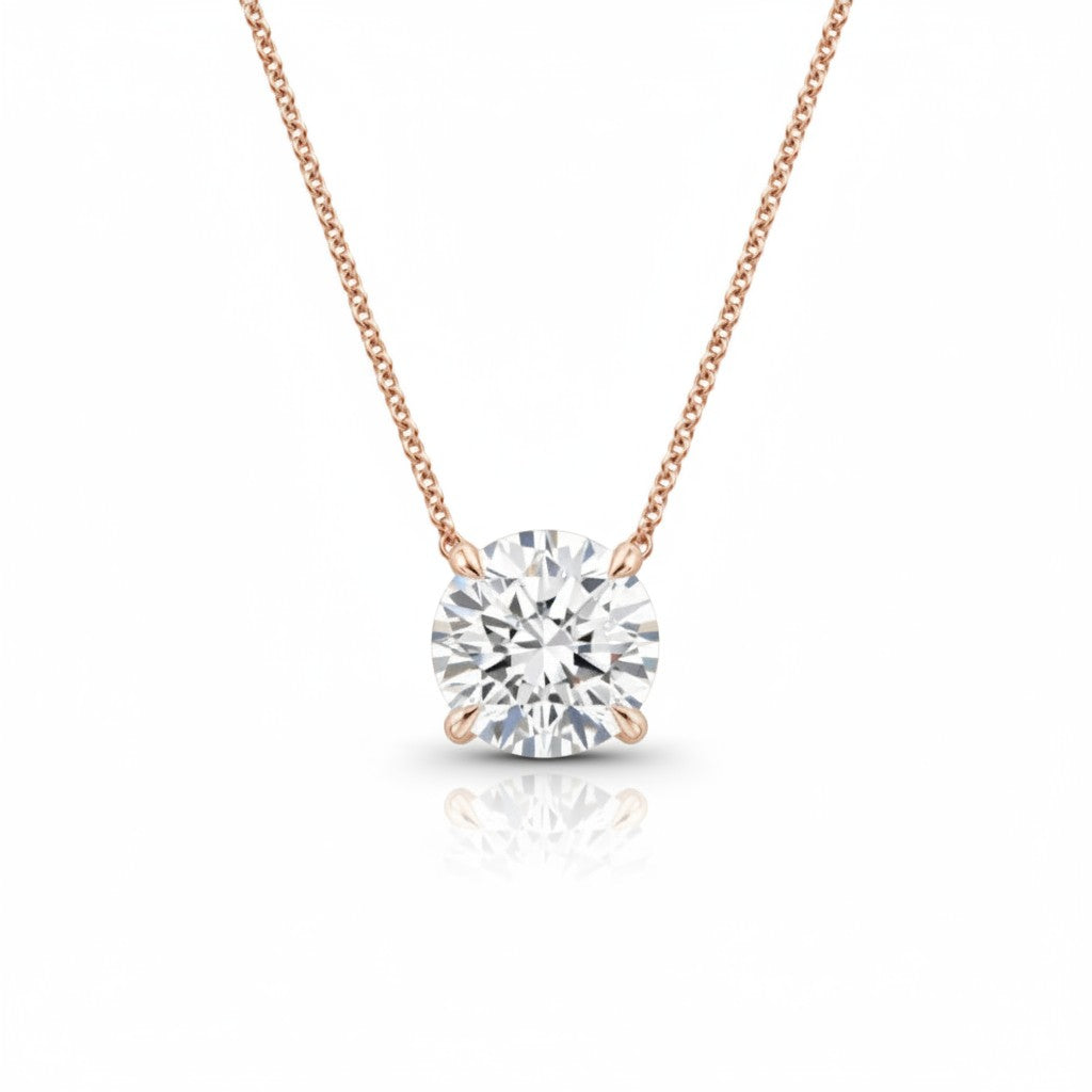 My Store 4 round brilliant-cut diamond solitaire pendant necklace in rose gold with a minimalist floating setting.