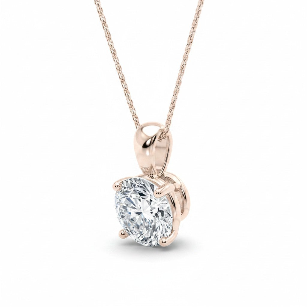 My Store 4 round brilliant-cut diamond solitaire pendant in rose gold with a four-prong setting on a delicate chain.