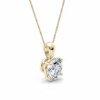 My Store 4 round brilliant-cut diamond solitaire pendant in 18K yellow gold with a four-prong setting and cable chain.