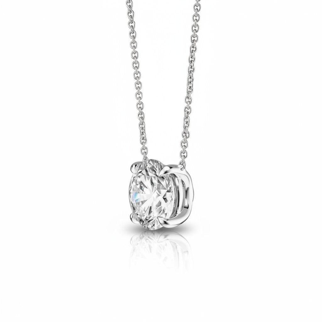 My Store 4 round brilliant-cut diamond solitaire pendant in a bail-free white gold setting on a delicate cable chain.