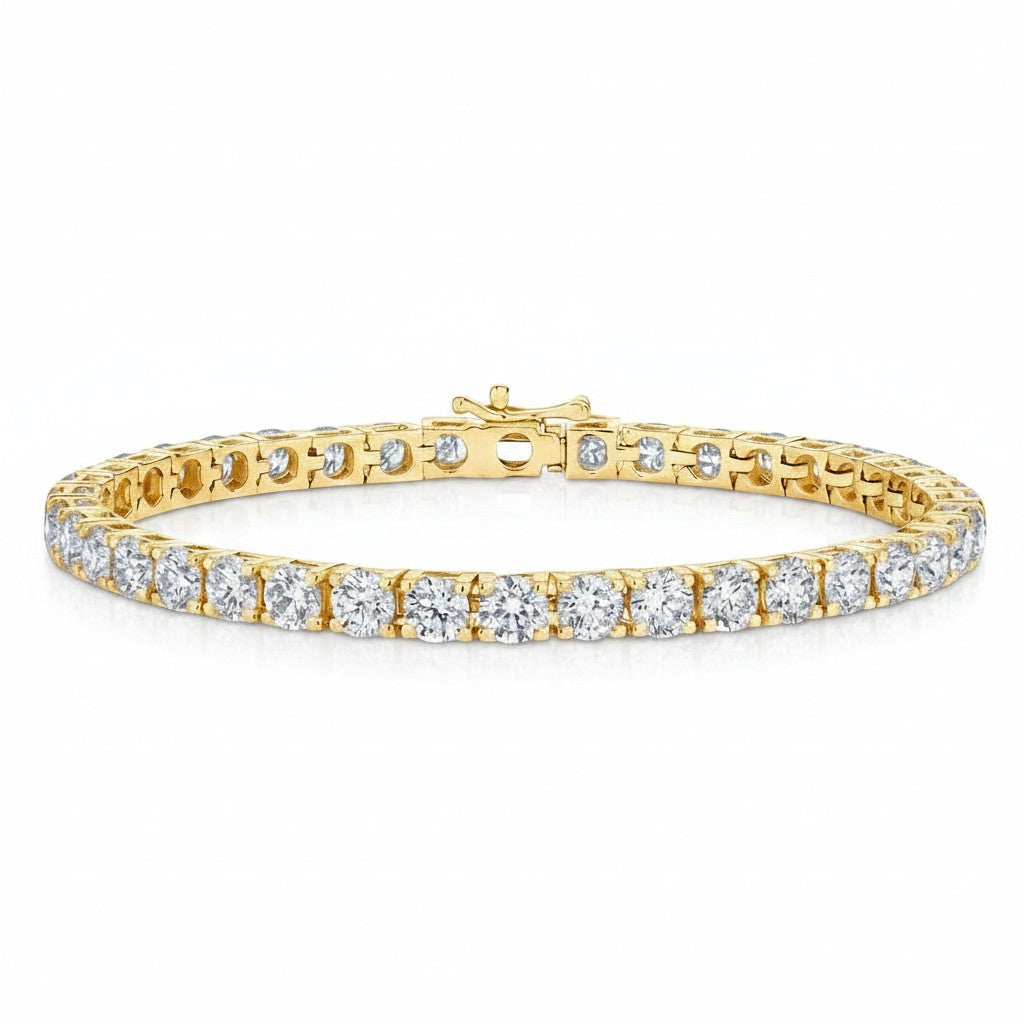 My Store 4 custom 4-prong round brilliant diamond tennis bracelet in yellow gold with a secure box clasp.