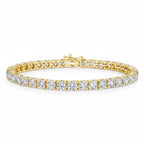 My Store 4 custom 4-prong round brilliant diamond tennis bracelet in yellow gold with a secure box clasp.