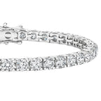 My Store 4 custom 4-prong round brilliant diamond tennis bracelet in white gold with a secure box clasp.