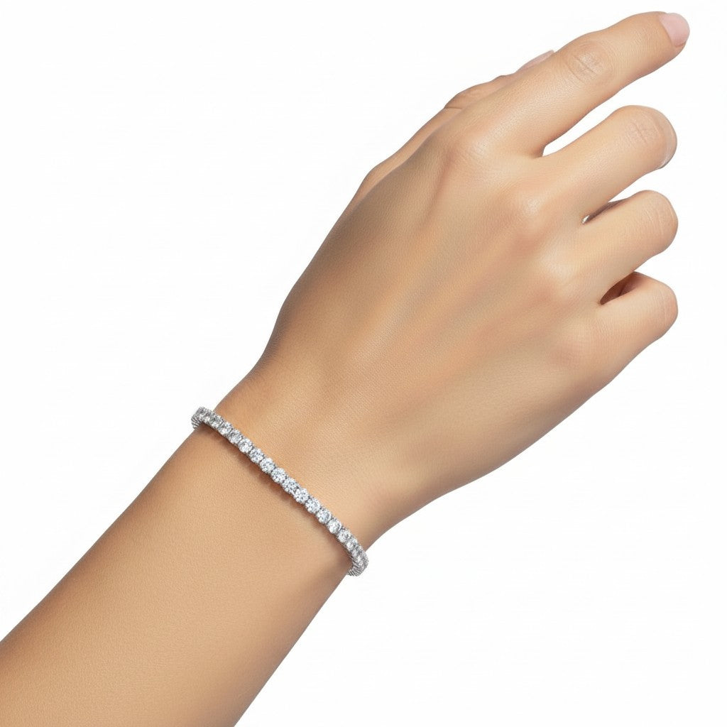 My Store 4 round brilliant diamond tennis bracelet in a low-profile four-prong setting worn on a woman's wrist