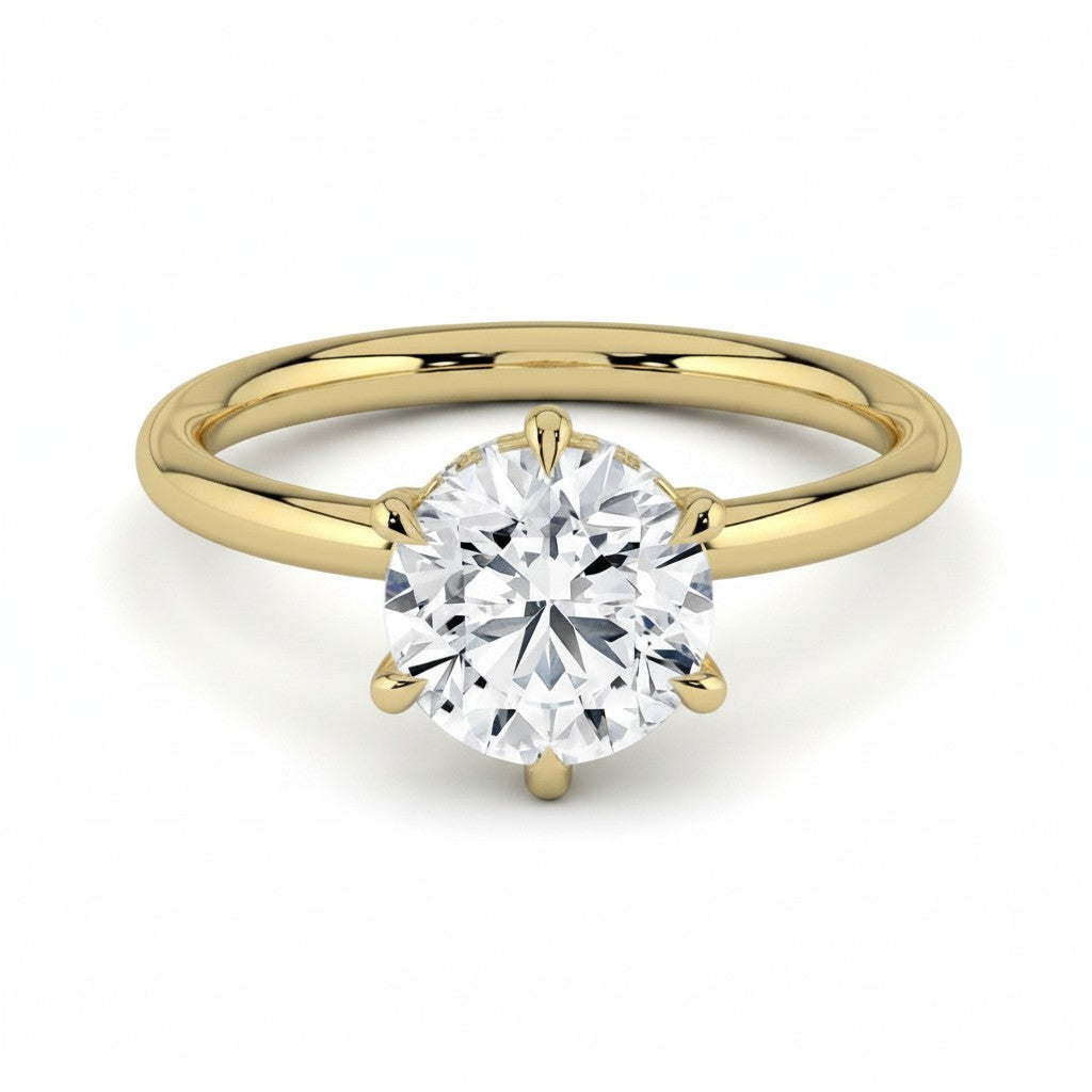 My Store 4 round cut solitaire engagement ring in yellow gold with a 6-prong setting and hidden micro-pavé halo.