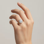 My Store 4 18K solid gold vintage halo engagement ring with a round-cut lab-grown diamond worn on a woman's finger.