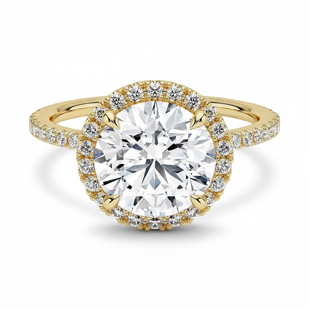 My Store 4 round brilliant cut diamond engagement ring with a micro-pavé halo and diamond-set 18K yellow gold band.