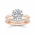 My Store 4 round solitaire engagement ring and marquise diamond chevron wedding band set in polished rose gold.
