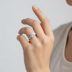 My Store 4 round cut solitaire engagement ring with hidden halo on a woman's finger