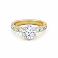 My Store 4 round brilliant cut solitaire engagement ring with a full eternity diamond band in 18K yellow gold.