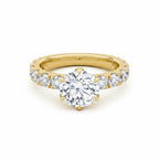 My Store 4 round brilliant cut solitaire engagement ring with a full eternity diamond band in 18K yellow gold.